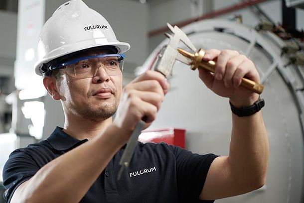 Engineer inspecting and ensuring the quality of Fulcrum vacuum furnace