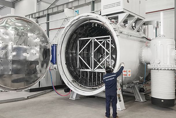 Skilled technician working on an innovative Fulcrum vacuum furnace